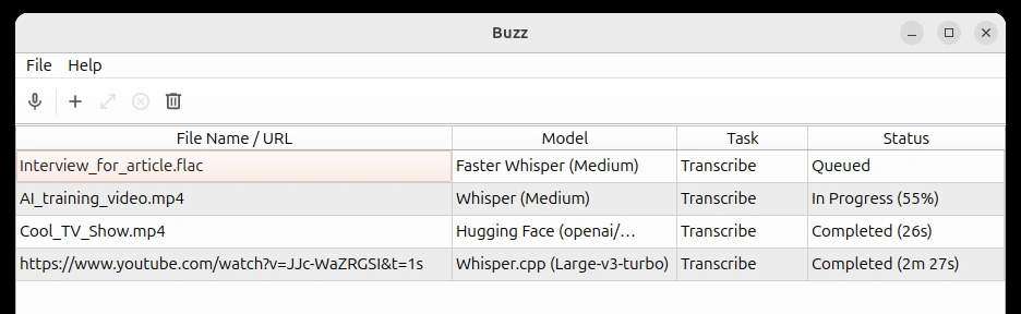 Buzz desktop file list showing transcription jobs, chosen models and their status
