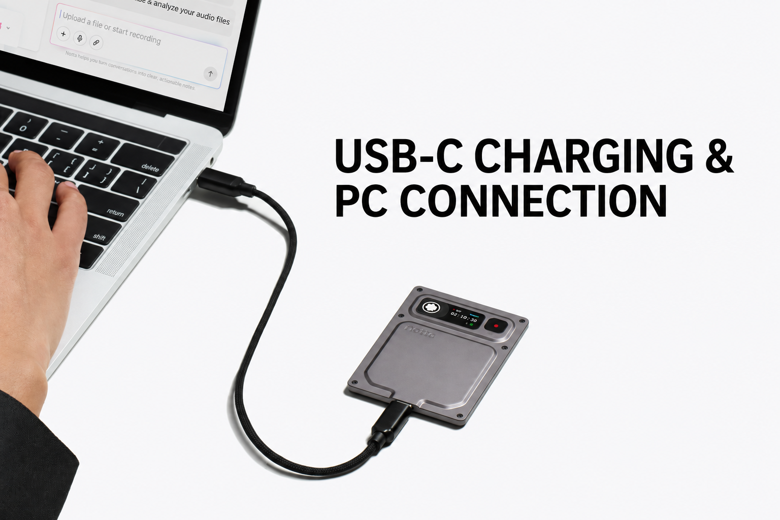 Notta Memo Pro connected to a computer with a USB-C cable