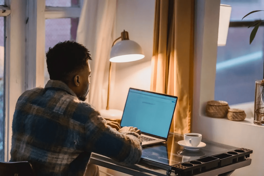 A man transcribing a recording