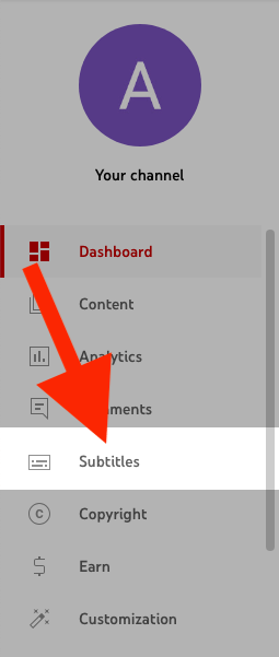 A red arrow pointing to the Subtitles button