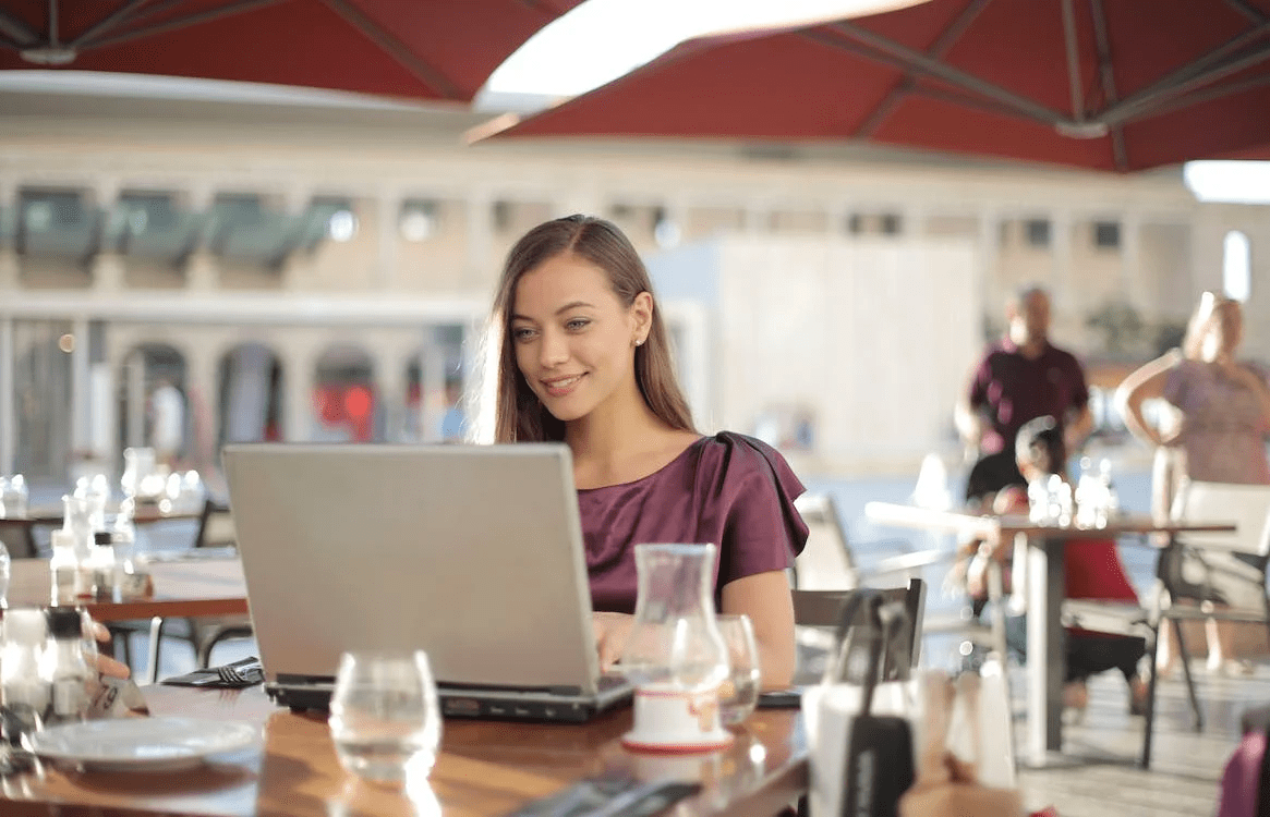 a woman using her laptop