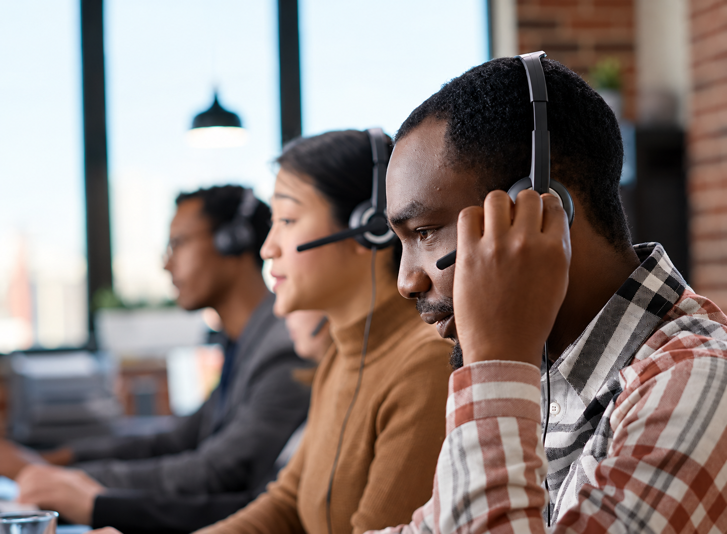 A sales team speaking with customers