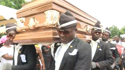 Ghanaian Dancing Pallbearers. Funeral Dance Meme Scene.